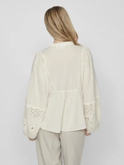 Dames blouse lange mouw bruin